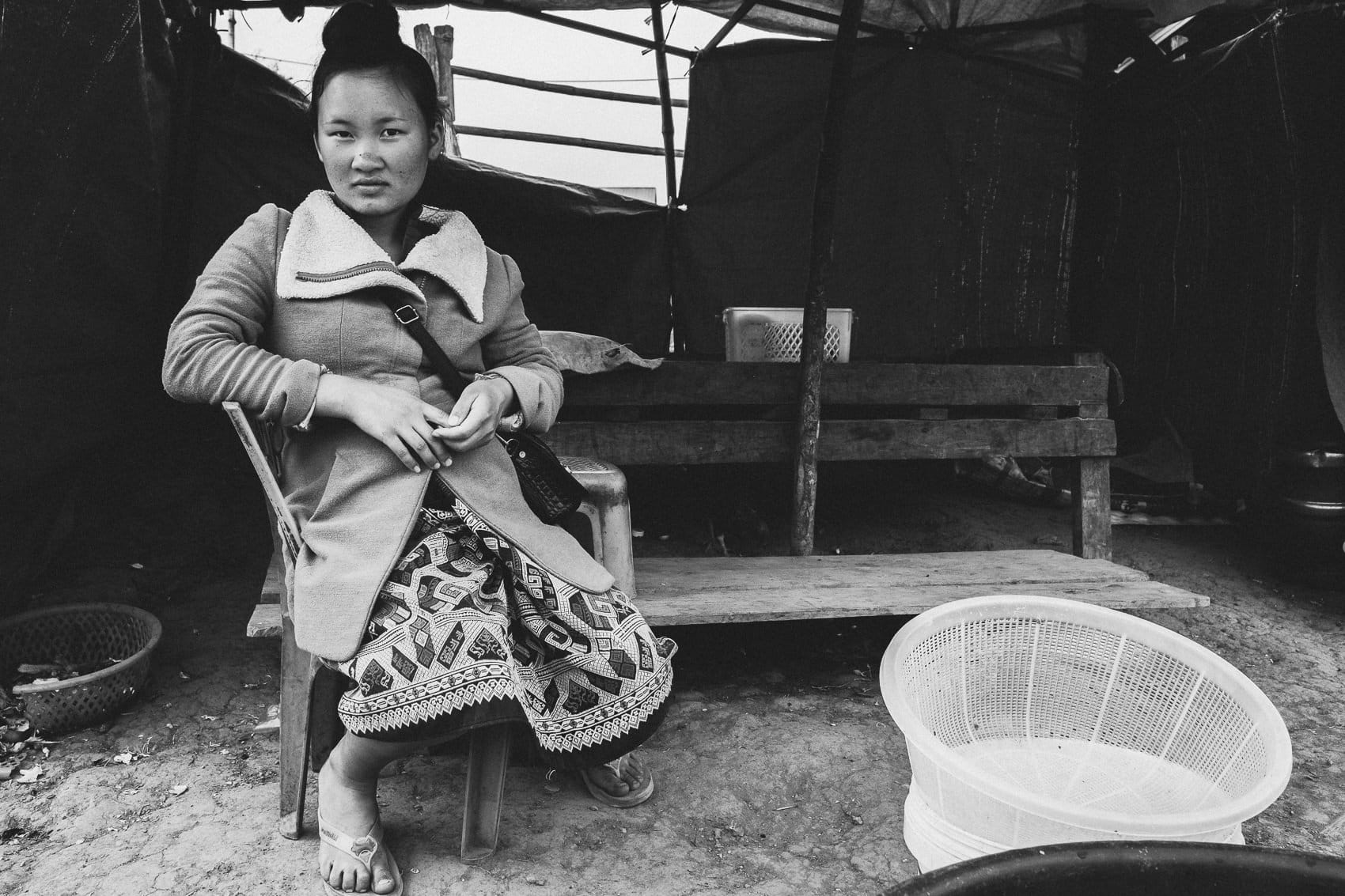 Laos Phonsavan 2019 06 On Bench